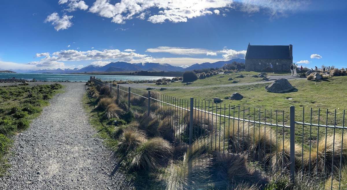 The historic stone chapel at Lake Tekapo is the iconic Church of the Good Shepherd, built in 1935 on the turquoise lake's shores as a memorial to the Mackenzie Country's pioneers, famous for its stunn